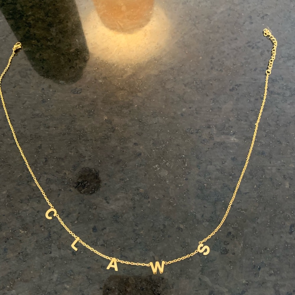 Claws drink of choice gold letter necklace